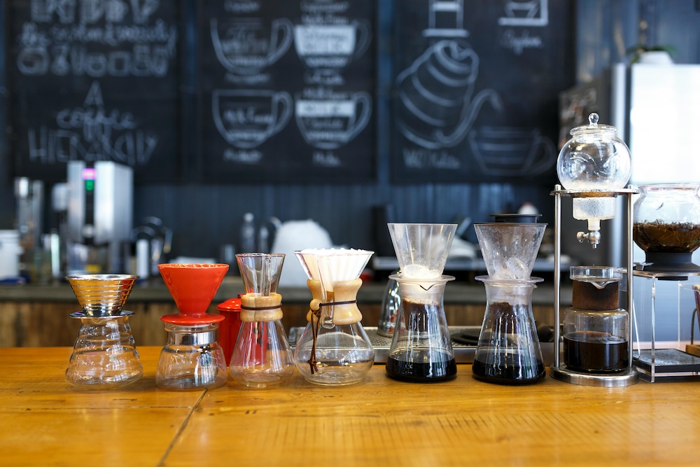 Different pour over coffee makers on a counter